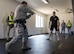 U.S. Air Force Staff Sgt. Jamie Tovar, 60th Security Forces Squadron successfully neutralizes the instructor during Defender Annual Refresher crucible training, Oct. 27, Travis Air Force Base, Calif.  60th SFS team members go through a 30-day period of intense training for the DART program. The teams of specially trained security forces personnel are dedicated to providing security for terrorist and criminal threat areas.
