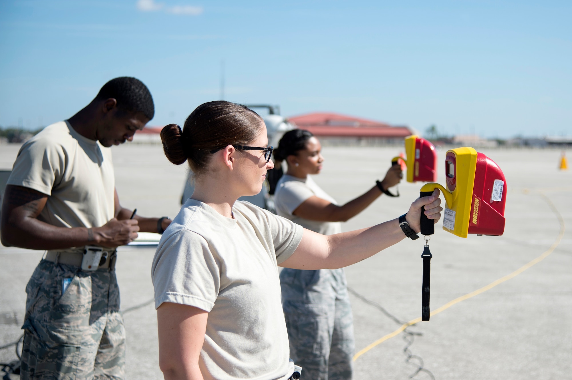 U.S. Air Force bioenvironmental engineering technicians assigned to the 6th Aerospace Medicine Squadron, perform a radiation scatter survey at MacDill Air Force Base, Fla., Nov. 7, 2017.