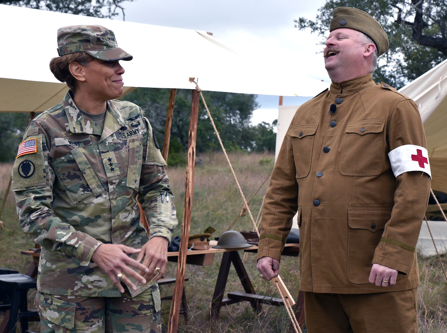 Lt Gen. Nadja Y. West, Surgeon General of the U.S. Army and commanding general, U.S. Army Medical Command, with Scott C. Woodard Historian, Office of Medical History, at the World War I medical first aid station. The theme for this year's competition was World War I with cadre members operating the lanes dressed in period uniforms.