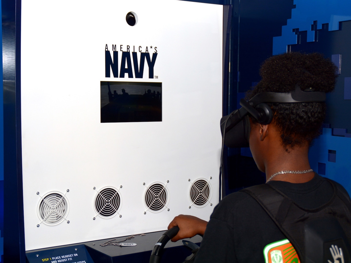 SAN ANTONIO – (Nov. 3, 2017) A student attending Sam Houston High School was amongst 3,200 high school students from San Antonio and surrounding areas who visited the Navy’s virtual reality experience, the “Nimitz” during the 2017 Joint Base San Antonio Air Show and Open House aboard JBSA-Lackland Kelly Field Annex.  The experience began with a video briefing on a Special Warfare Combatant-Craft Crewmen mission to extract Navy SEALs, the virtual reality mission, and a debriefing on participants’ performance during the mission.
