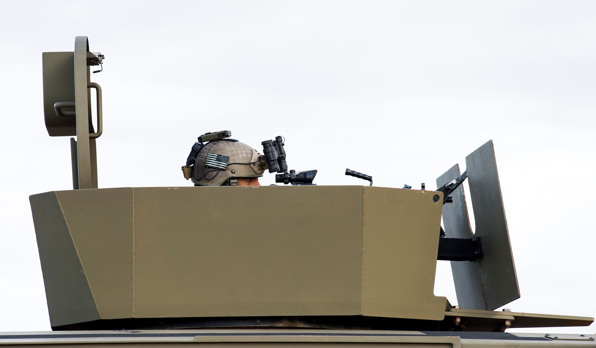 Airman manning a vehicle gun