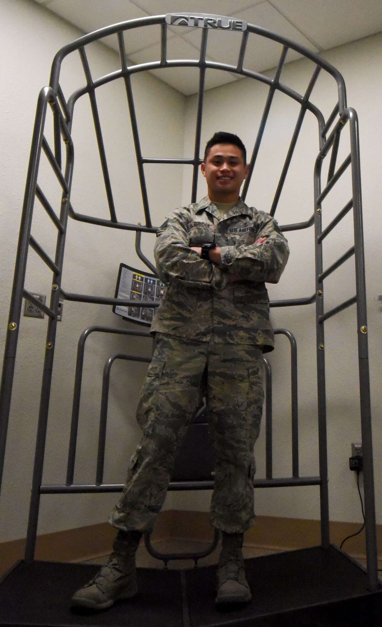 Senior Airman Rigel Bridge, 90th Medical Group physical medicine journeyman, poses for a photo on F.E. Warren Air Force Base, Wyo., Nov. 9, 2017. Bridge provides physical therapy assistance to wounded service members.