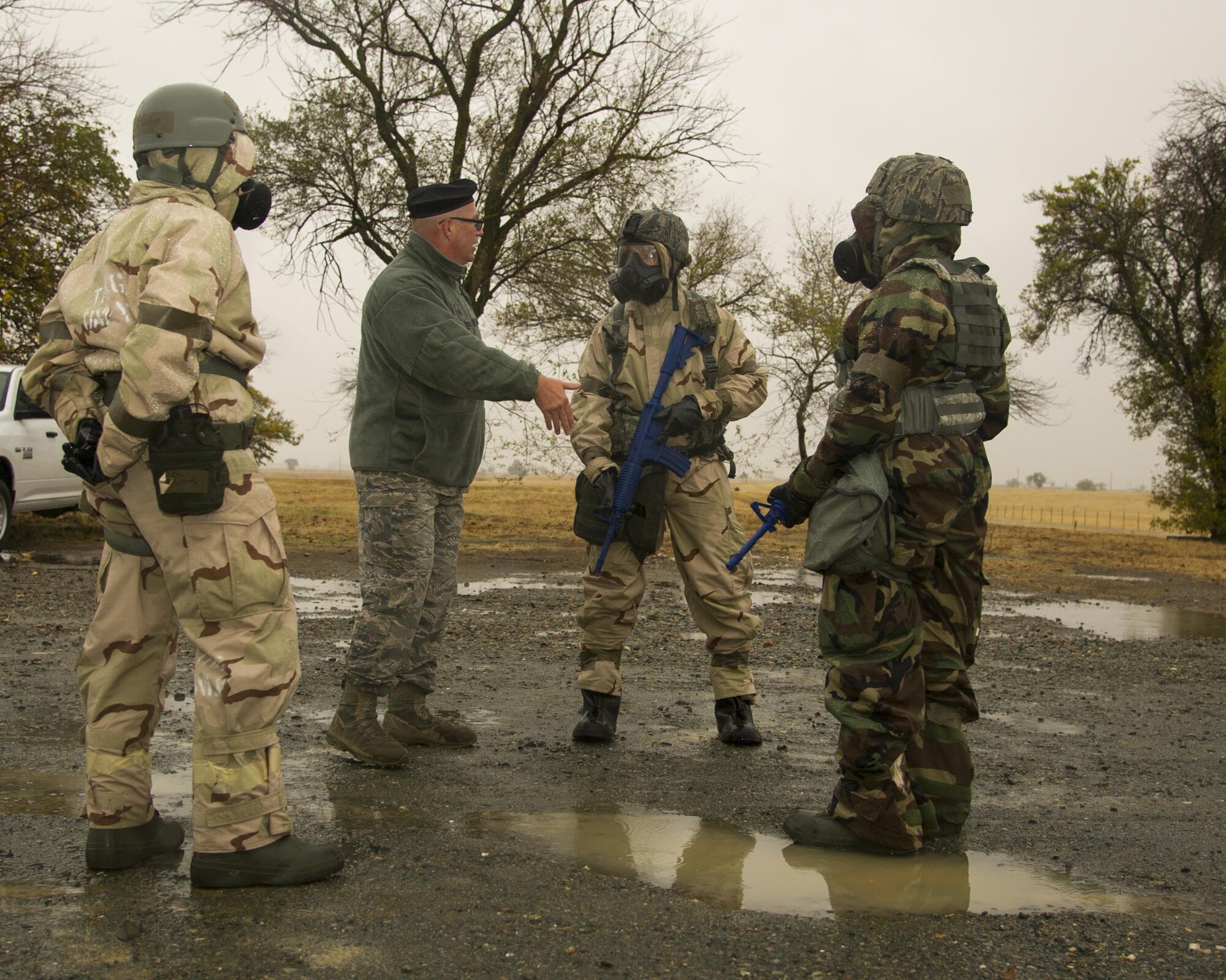 Tech. Sgt. John Fergerson, a noncommisioned officer with the 940th Security Forces Squadron, explains the importance of the entry control point to Airmen during the Ability to Survive and Operate exercise Nov. 4 at Beale Air Force Base, California. Reservists from the 940th Air Refueling Wing and 38th Intelligence Squadron participated in the exercise. (U.S. Air Force photo by Senior Airman Tara R. Abrahams)