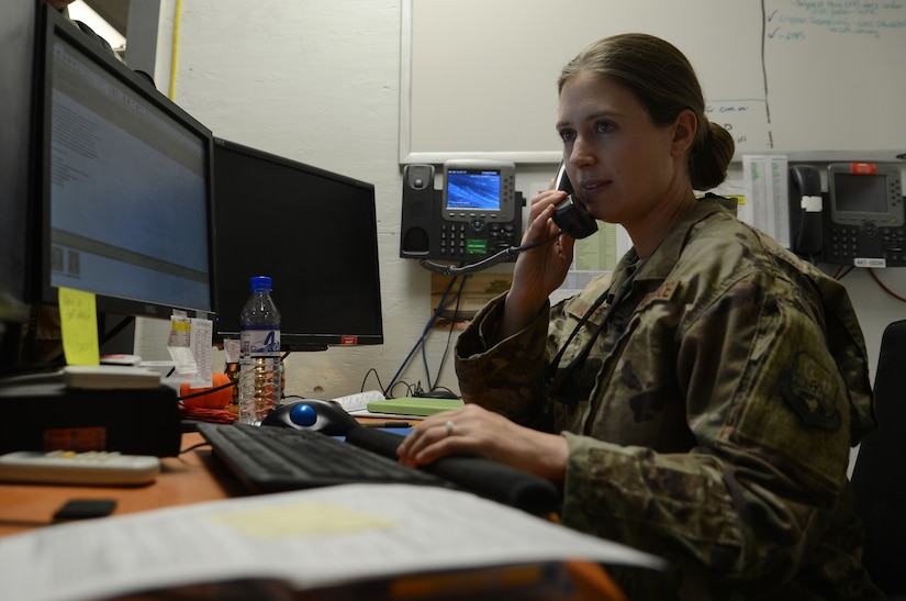 Staff Sgt. Beverly Murtiff, 455th Expeditionary Civil Engineer Squadron customer service lead, takes in a work order via phone call Nov. 6, 2017 at Bagram Airfield, Afghanistan.