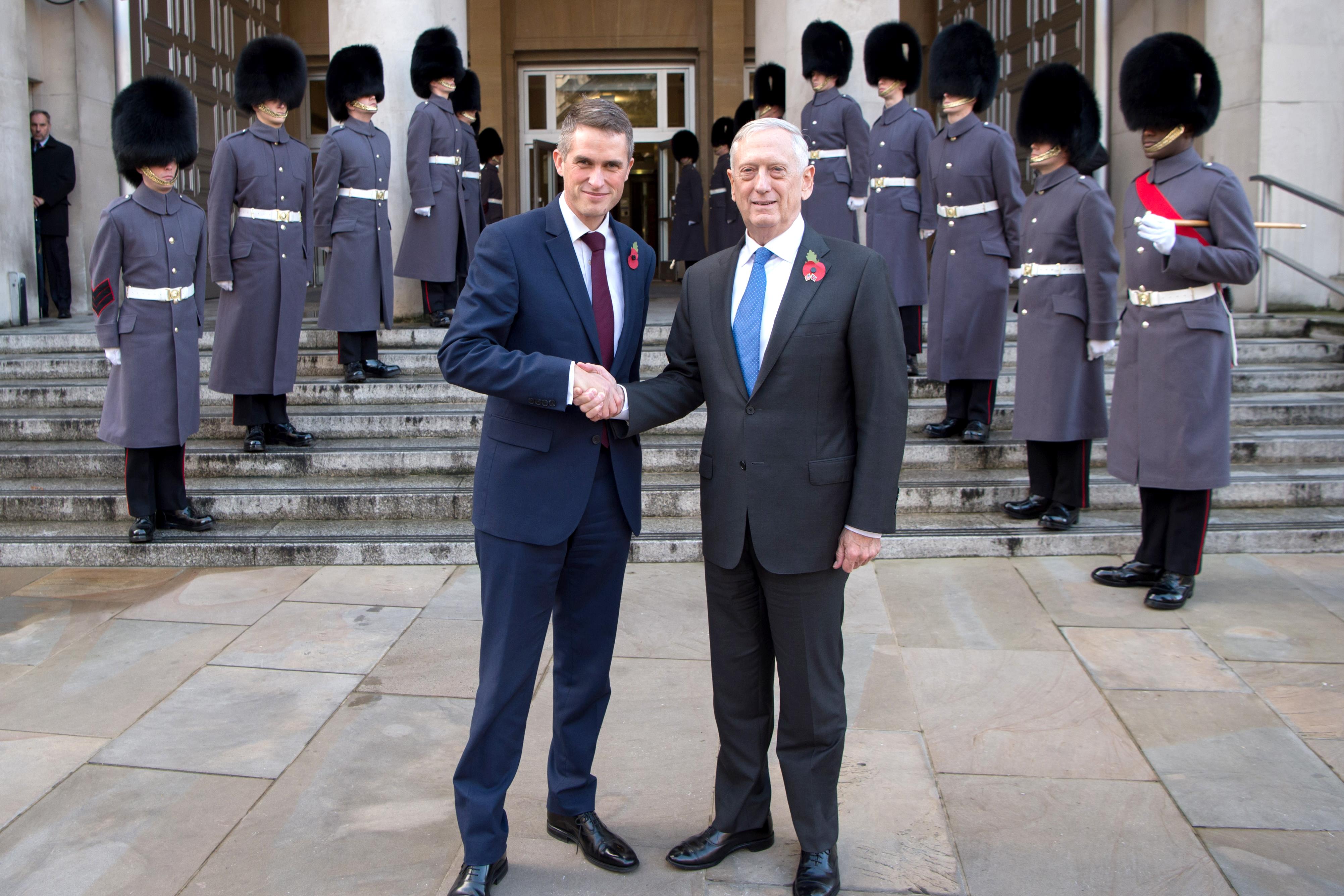 Defense Secretary Jim Mattis poses with the British defense secretary.