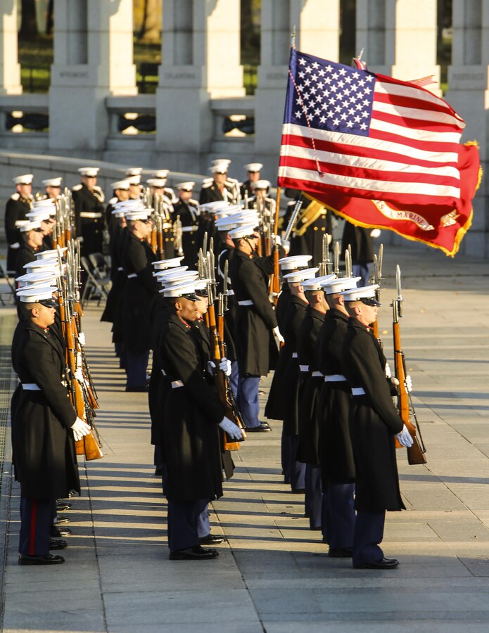 Marching companies with Marine Barracks Washington D.C. render honors during the Marine Corps’ Birthday Wreath Laying Ceremony at the World War II Memorial, Washington D.C., Nov. 10, 2017. The wreath laying ceremony is an annual event held to celebrate the U.S. Marine Corps’ birthday and honor those who gave the last measure of devotion to country and Corps. (Official U.S. Marine Corps photo by Cpl. Damon A. Mclean/Released)