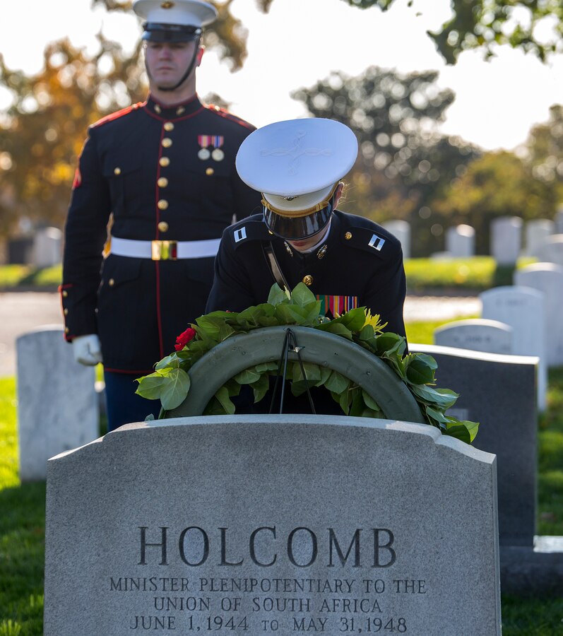 Captain Kaitlin E. Kleiber, officer with Marine Barracks Washington D.C., lays a wreath at the gravestone of Gen. Thomas Holcomb, 17th Commandant of the Marine Corps, during a wreath laying ceremony at Arlington National Cemetery, Arlington, Va., Nov. 10, 2017. The wreath laying ceremony is an annual event held to celebrate the U.S. Marine Corps’ birthday and honor those who gave the last full measure of devotion to country and Corps. (Official U.S. Marine Corps photo by Cpl. Robert Knapp/Released)