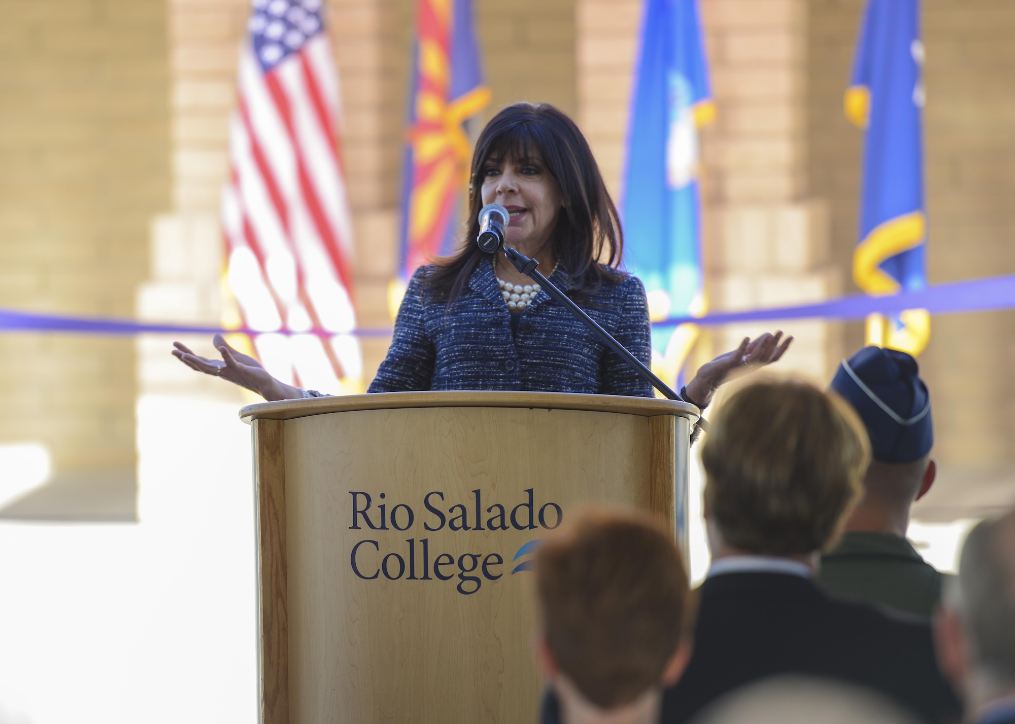 Dr. Maria Harper-Marinick, Maricopa Community Colleges chancellor, speaks to a crowd of visitors at the grand opening of the Military and Veteran Success Center at Luke Air Force Base, Ariz., Nov. 9, 2017. The MVSC is a community supported, case-managed, holistic support center for transitioning service members, veterans and their dependents. (U.S. Air Force photo/Airman 1st Class Caleb Worpel)