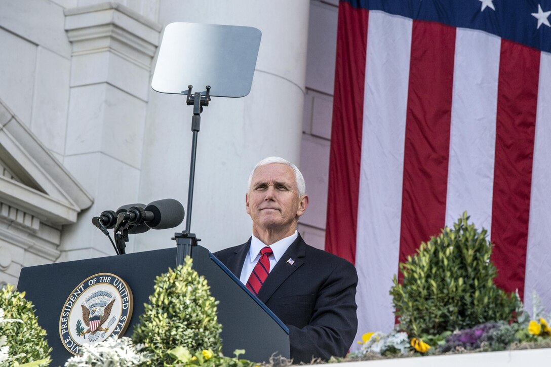 Vice President Mike Pence stands at a podium.