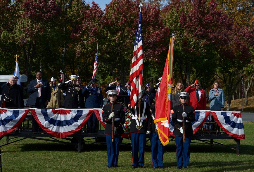 Members of a color guard from Quantico Marine Corps Base present the colors during a Veterans Day ceremony at Quantico National Cemetery in Quantico, Va., Nov. 11, 2017. The Veterans Day ceremony is an annual event hosted by the Potomac Region Veterans Council. The event featured a performance by the Quantico Marine Corps Band. (U.S. Air Force photo by Tech. Sgt. Dan DeCook)