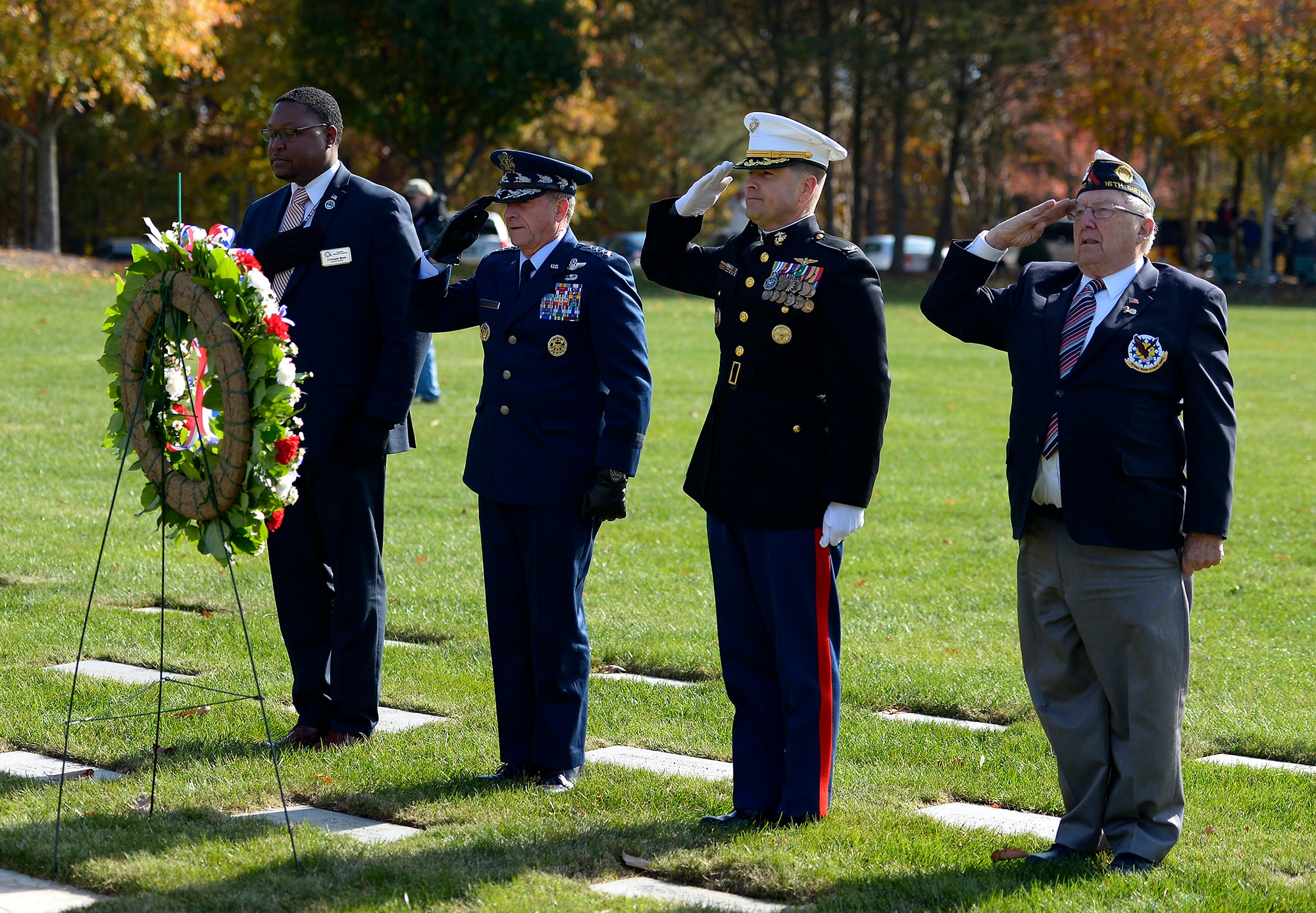 Air Force Chief of Staff Gen. David L. Goldfein salutes after placing a wreath during a Veterans Day ceremony at Quantico National Cemetery in Quantico, Va., Nov. 11, 2017. The Veterans Day ceremony is an annual event hosted by the Potomac Region Veterans Council. The event featured a performance by the Quantico Marine Corps Band. (U.S. Air Force photo by Tech. Sgt. Dan DeCook)