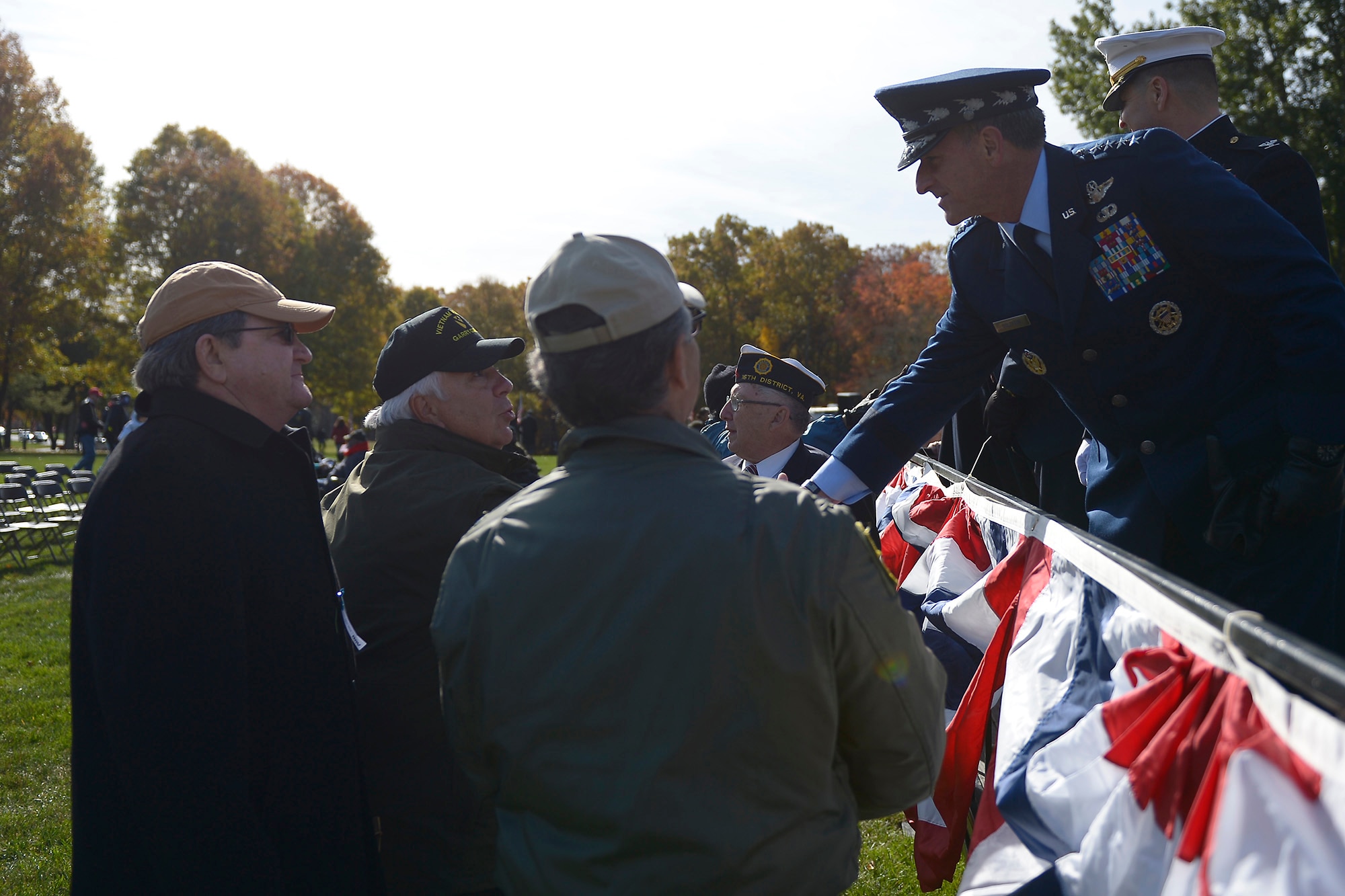 Air Force Chief of Staff Gen. David L. Goldfein shakes hands with veterans who attended this year’s Veterans Day ceremony at Quantico National Cemetery in Quantico, Va., Nov. 11, 2017. The Veterans Day ceremony is an annual event hosted by the Potomac Region Veterans Council. The event featured a performance by the Quantico Marine Corps Band. (U.S. Air Force photo by Tech. Sgt. Dan DeCook)