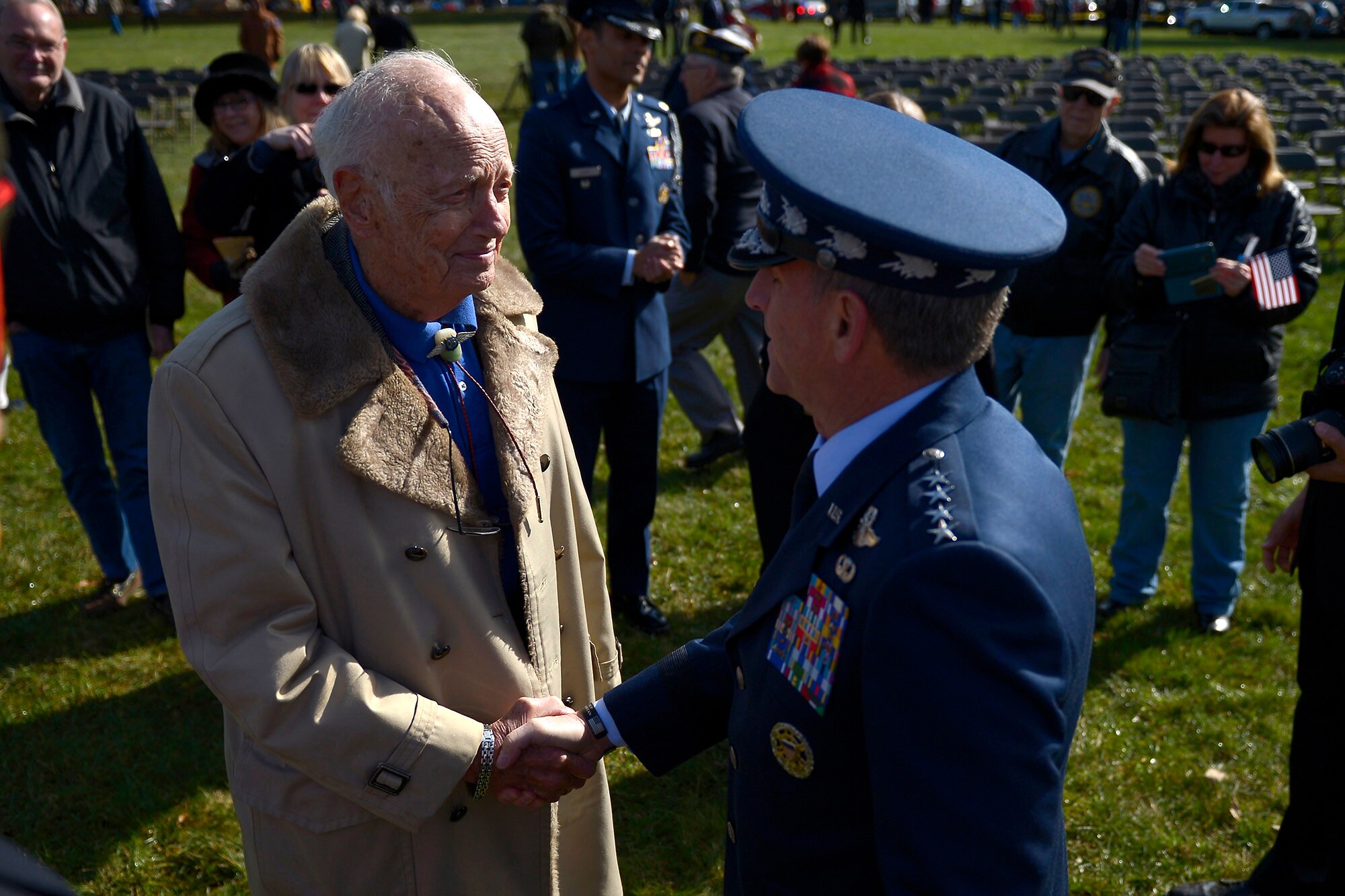 Air Force Chief of Staff Gen. David L. Goldfein shakes hands with (Ret) Col. Eugene Deatrick after a Veterans Day ceremony at Quantico National Cemetery in Quantico, Va., Nov. 11, 2017. The Veterans Day ceremony is an annual event hosted by the Potomac Region Veterans Council. The event featured a performance by the Quantico Marine Corps Band. (U.S. Air Force photo by Tech. Sgt. Dan DeCook)