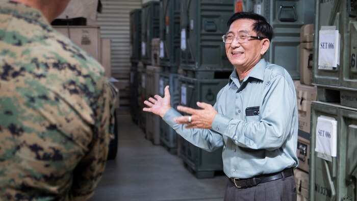 Sonny Wong, a Vietnam veteran, shares stories about the unit during his tour of 12th Marine Regiments facilities Nov. 7, 2017, at 12th Marine Regiment’s company office on Camp Hansen, Okinawa, Japan.