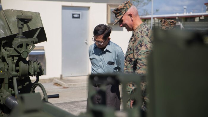 Sonny Wong, a Vietnam veteran, shares stories about the unit during his tour of 12th Marine Regiments facilities Nov. 7, 2017, at 12th Marine Regiment’s company office on Camp Hansen, Okinawa, Japan.