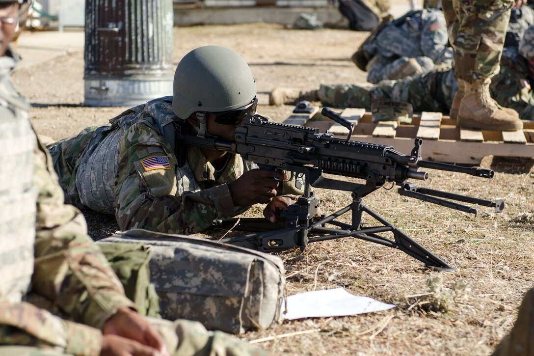 A soldiers practices target acquisition during training.
