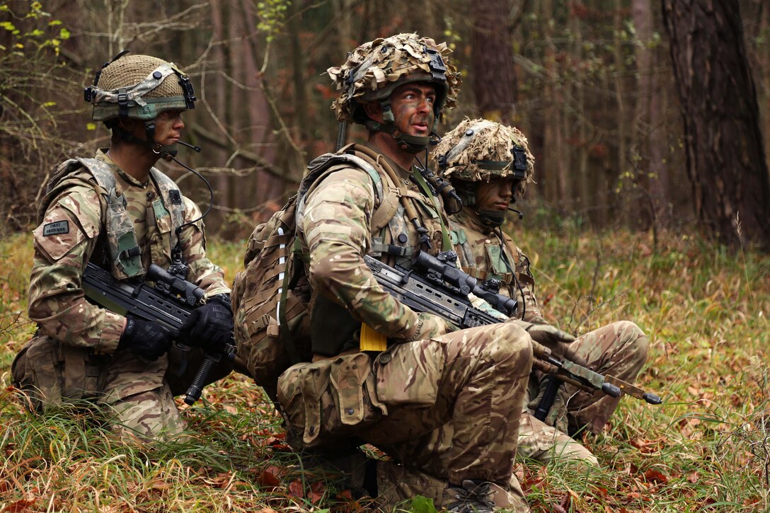 British soldiers prepare to move out on a reconnaissance mission during exercise Allied Spirit VII.
