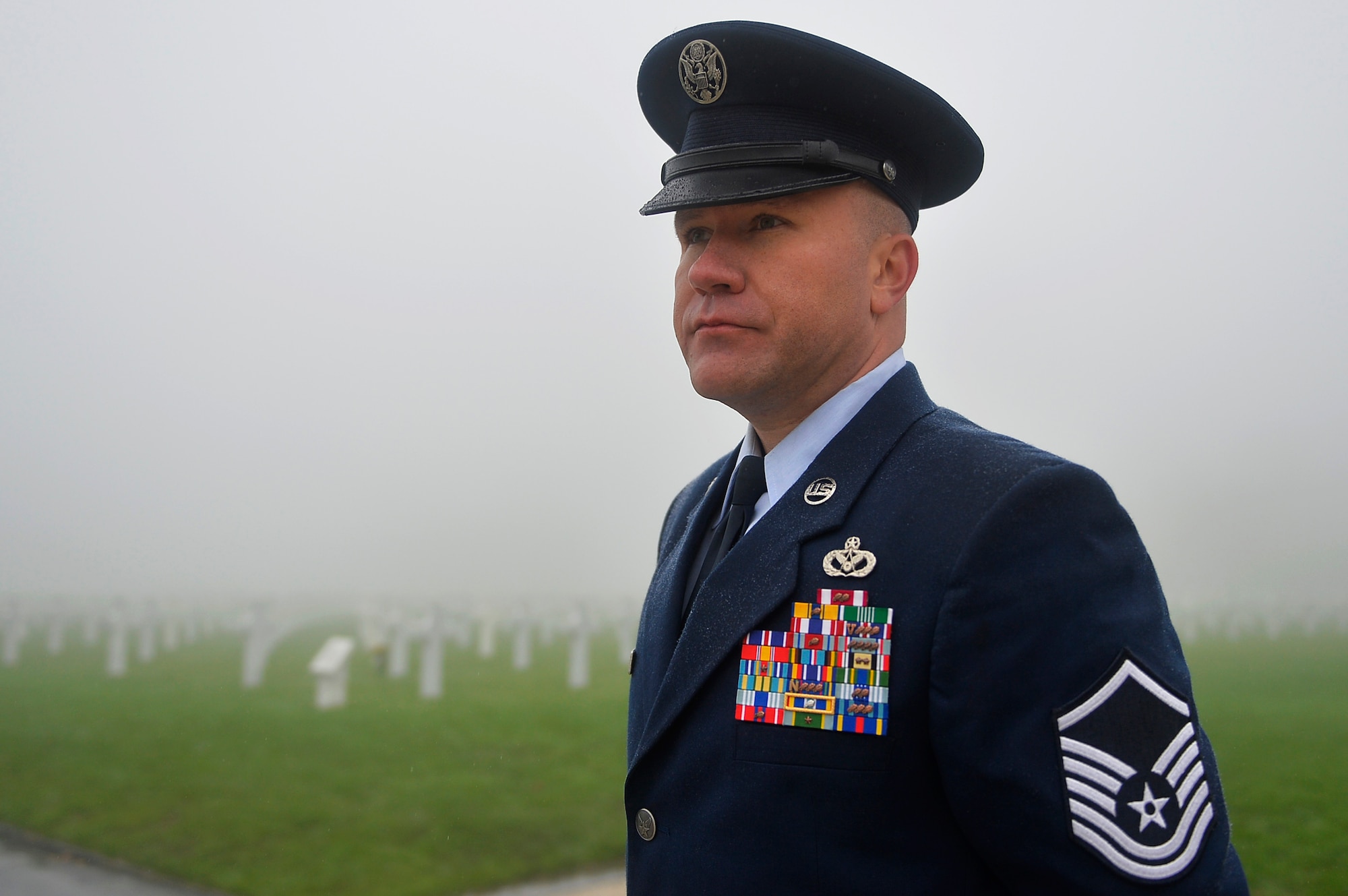 U.S. Air Force Master Sgt. Michael Murieen, 786th Civil Engineer Squadron water and fuel systems maintenance section chief, visits Henri-Chapelle American Cemetery and Memorial, Belgium, Nov. 11, 2017. Veterans Day in the U.S. originated from Armistice Day, which commemorates the end of World War I. (U.S. Air Force photo by Airman 1st Class Joshua Magbanua)