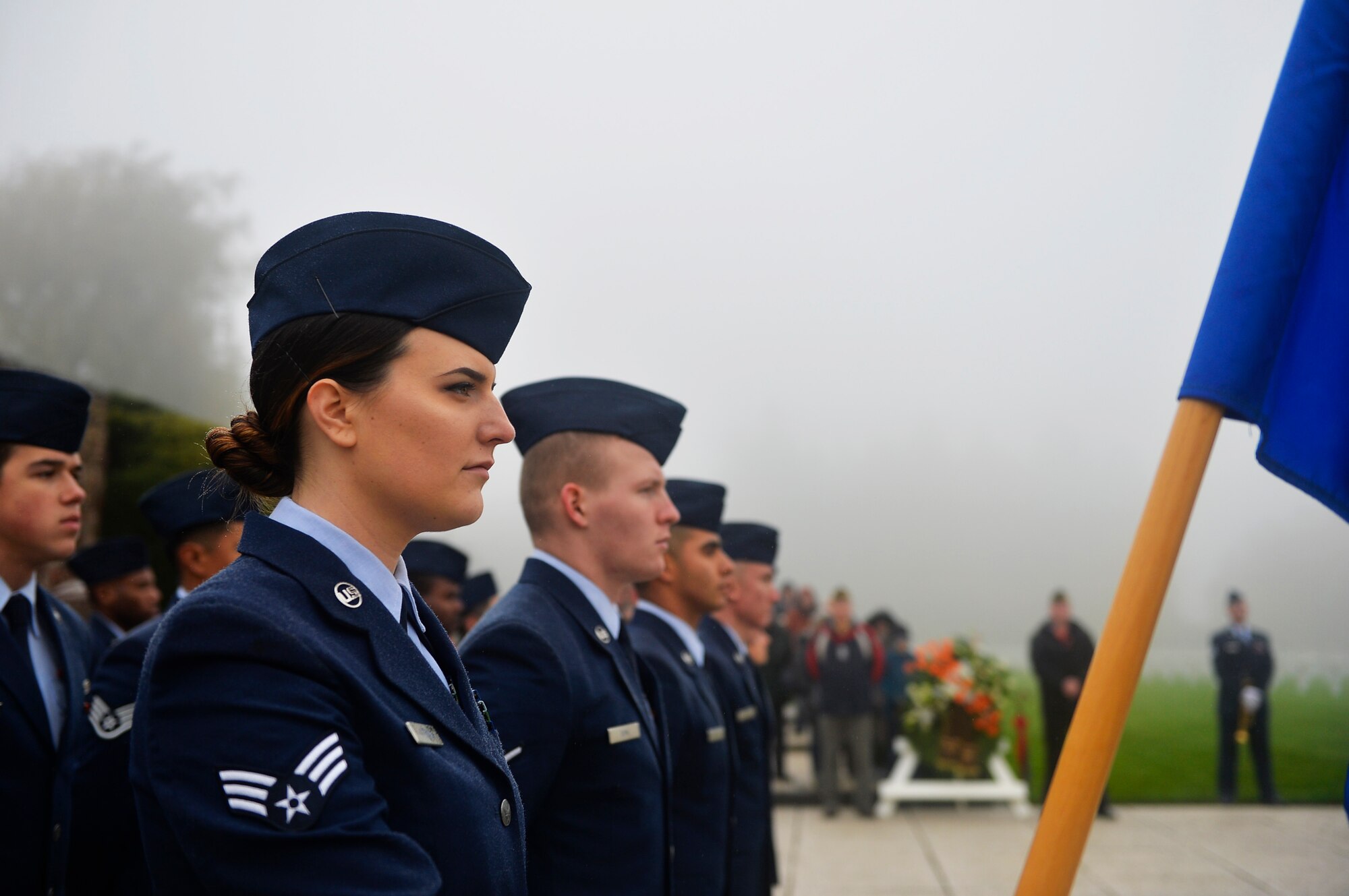 U.S. Air Force Airmen assigned to the 86th Civil Engineer Group stand in formation during a Veterans Day Ceremony at Henri-Chapelle American Cemetery and Memorial, Belgium, Nov. 11, 2017. The ceremony included speeches, a wreath-laying presentation, a hereditary nine gun salute, and a playing of the Belgian and American national anthems. (U.S. Air Force photo by Airman 1st Class Joshua Magbanua)