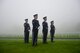 Members of an Air Force honor guard team stand in formation during a Veterans Day ceremony at Henri-Chapelle American Cemetery and Memorial, Belgium, Nov. 11, 2017. The team conducted a hereditary nine gun salute which historically signifies an end to hostilities for a period of time. (U.S. Air Force photo by Airman 1st Class Joshua Magbanua)