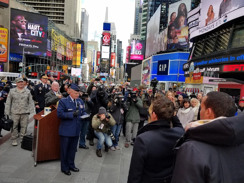 Major General Garrett Harencak, Commander, Air Force Recruiting Service, swears in new recruits at the Times Square Ribbon Cutting Ceremony