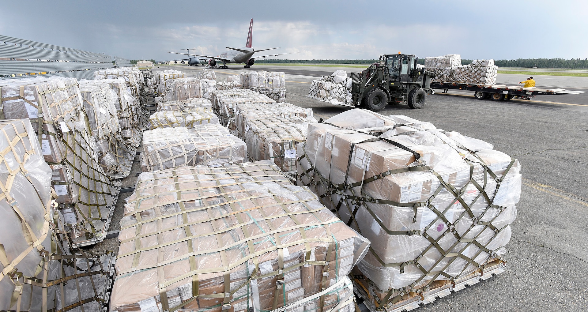 Firefighting supplies are loaded onto a Bureau of Land Management Alaska Fire Services truck after arriving at Eielson Air Force Base, Alaska. More than 127,000 pounds of supplies for Alaska firefighting efforts were delivered by the 60th Air Mobility Wing from Travis Air Force Base, California.