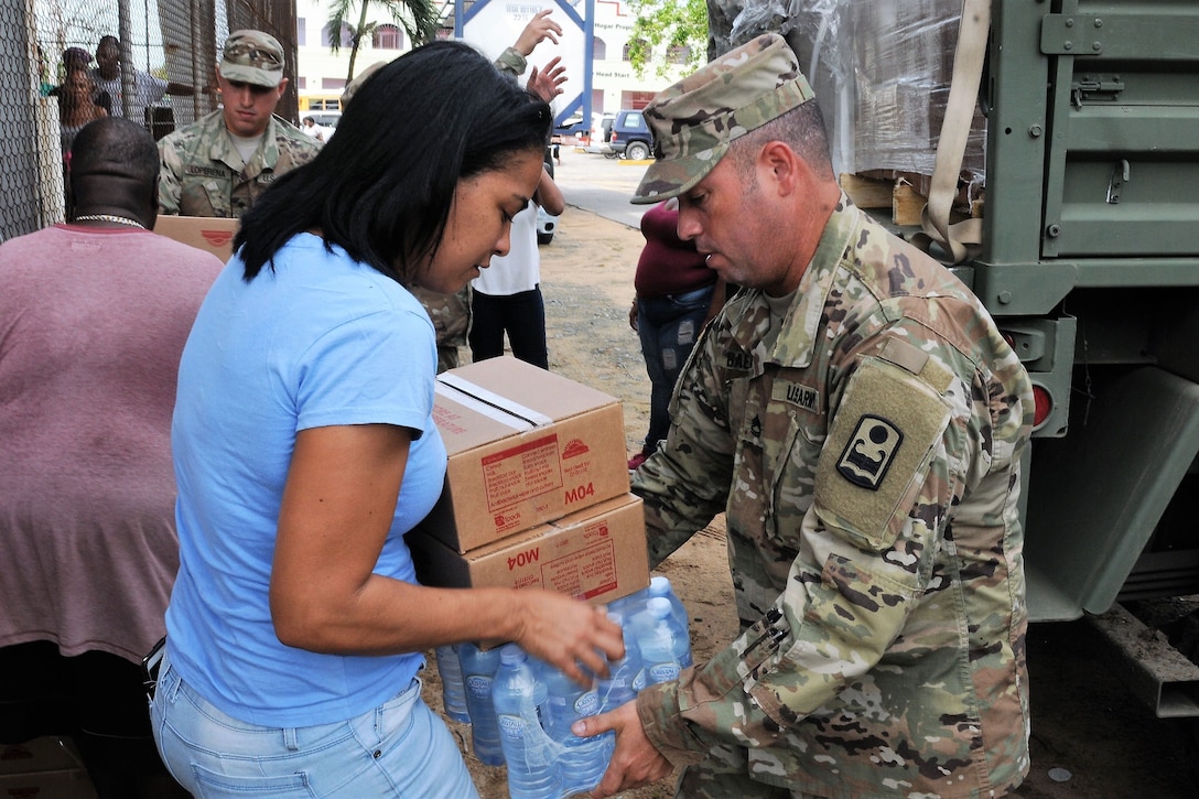 Soldiers arrive to give residents much needed assistance.