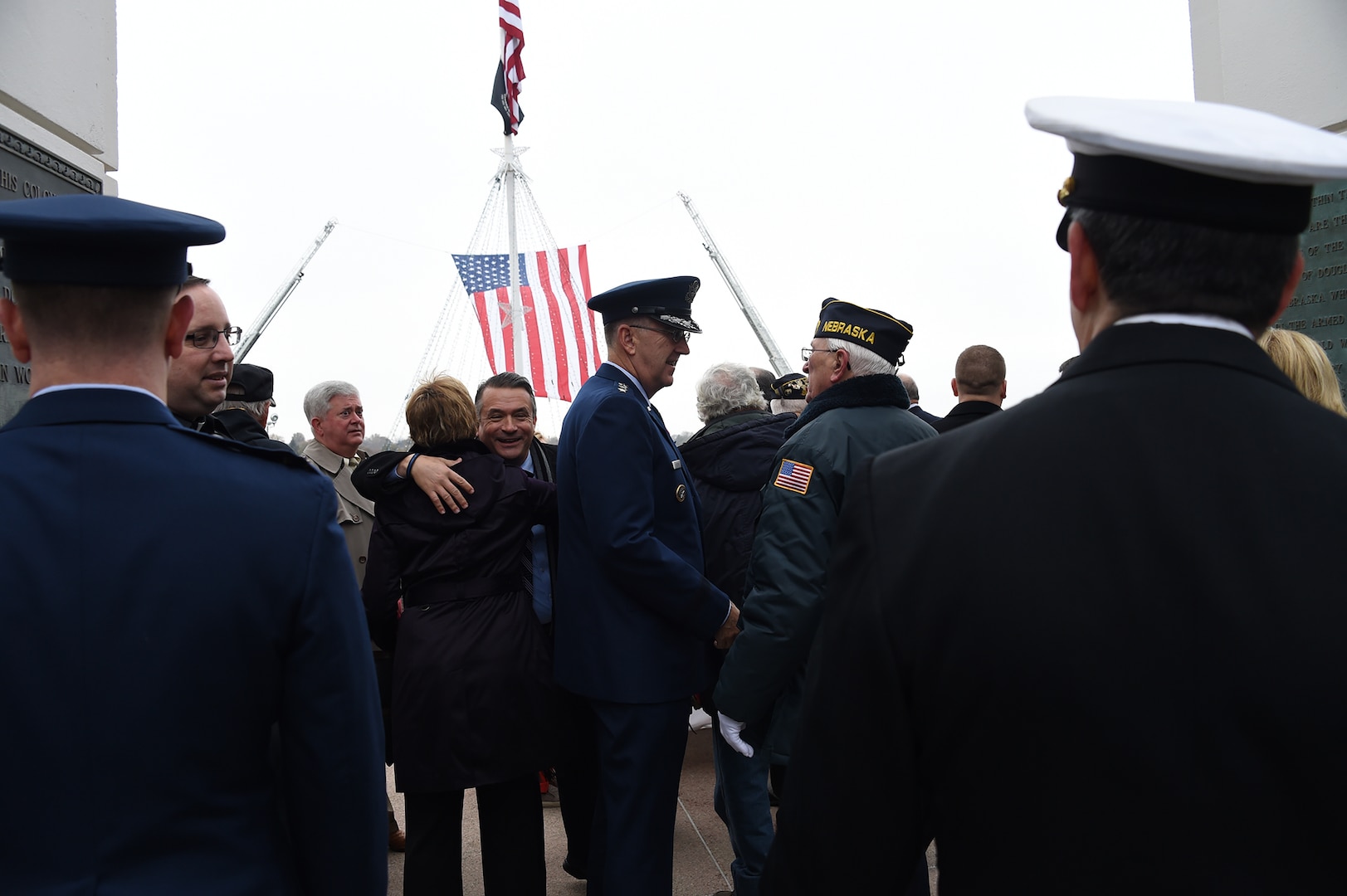 U.S. Air Force Gen. John Hyten (center), commander of U.S. Strategic Command, speaks with a member of the rifle team before a Veterans Day ceremony at Memorial Park in Omaha, Neb., Nov. 11, 2017. More than 200 people attended the ceremony to honor the service and sacrifice of American veterans and their families.