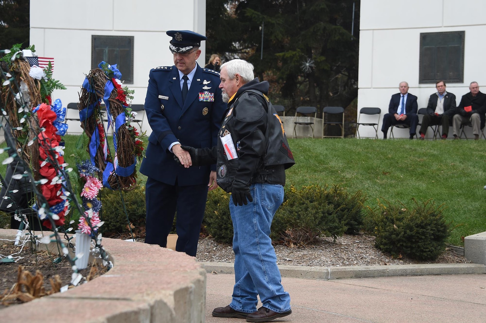 U.S. Air Force Gen. John Hyten, commander of U.S. Strategic Command, and Lonnie Ford, a Gold Star father, shake hands after placing a wreath to honor the sacrifice of American veterans during a Veterans Day ceremony at Memorial Park in Omaha, Neb., Nov. 11, 2017. Ford’s son, U.S. Army Sgt. Joshua Ford, was killed July 31, 2000, during combat operations in Al Numaniyah, Iraq. More than 200 people attended the ceremony to recognize the service of American veterans and their families.