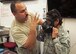 Staff Sgt. Salvador Gruny, 919th Special Operations Medical Squadron, performs a mask fit test