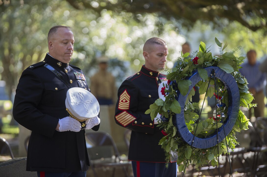 Col. Chris Steinhilber (left), 4th Marine Division chief of staff, and Sgt. Maj. Michael A. Miller (right), 4th MARDIV sergeant major, pay their respects during the invocation given at the annual wreath laying ceremony for Gen. Robert H. Barrow, the 27th Commandant of the Marine Corps, at Grace Church of West Feliciana, in Saint Francisville, La., Nov. 10, 2017.
