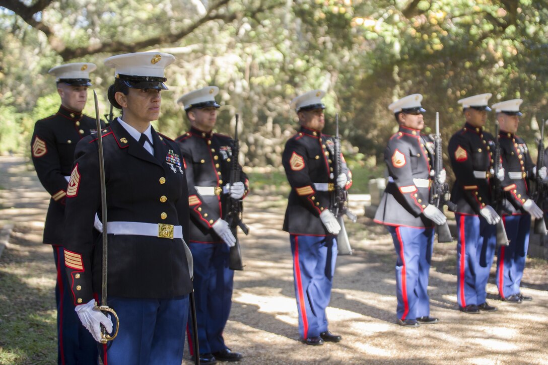 Marines with 1st and 2nd Platoon, Truck Company, 23rd Marine Regiment, 4th Marine Division, Marine Forces Reserve, present arms during the annual wreath laying ceremony for Gen. Robert H. Barrow, the 27th Commandant of the Marine Corps, at Grace Church of West Feliciana, in Saint Francisville, La., Nov. 10, 2017.