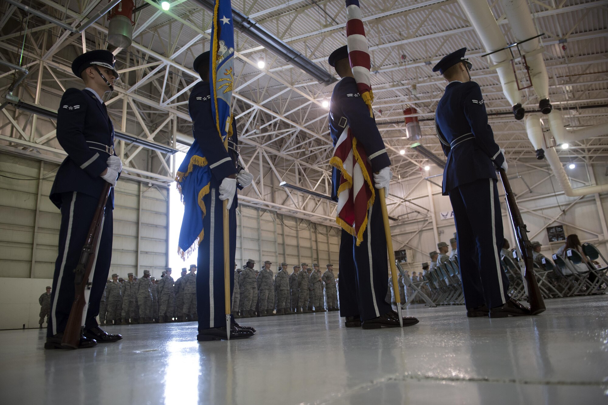 Moody Honor Guardsmen await the start of the 23d Maintenance Squadron re-designation ceremony, Nov. 9, 2017, at Moody Air Force Base, Ga. Lt. Col. Neal Van Houten took command of Air Combat Command’s second largest squadron, leading the 800 men and women who are responsible for executing safe and reliable maintenance on aircraft systems, ground equipment and munitions to support the 23d Wing's attack and rescue missions. (U.S. Air Force photo by Senior Airman Greg Nash)