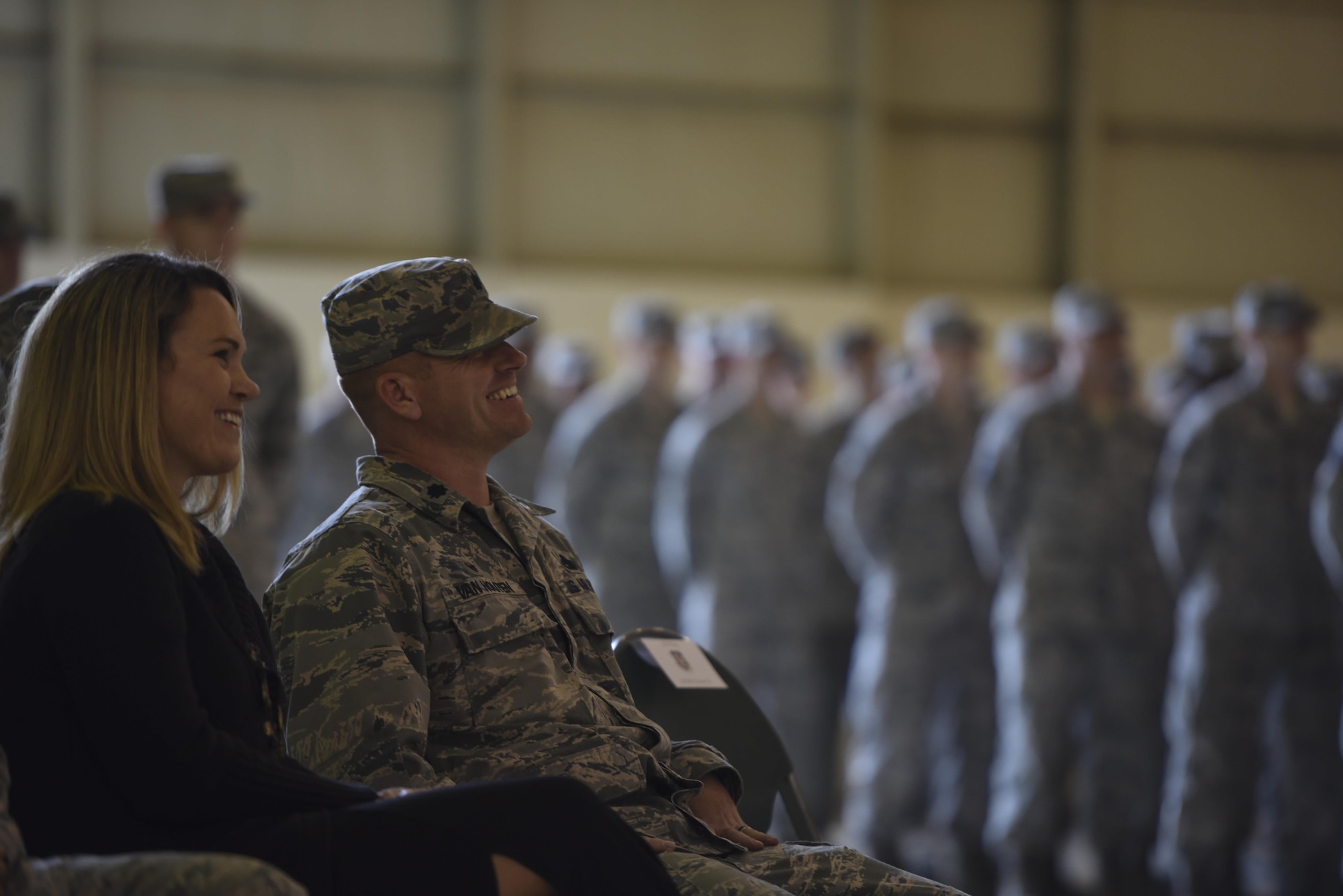 Lt. Col. Neal Van Houten, former 23d Equipment Maintenance Squadron commander, shares a laugh before taking command of the newly re-designated 23d Maintenance Squadron, Nov. 9, 2017, at Moody Air Force Base, Ga. Van Houten took command of Air Combat Command’s second largest squadron, leading the 800 men and women who are responsible for executing safe and reliable maintenance on aircraft systems, ground equipment and munitions to support the 23d Wing's attack and rescue missions. (U.S. Air Force photo by Senior Airman Greg Nash)