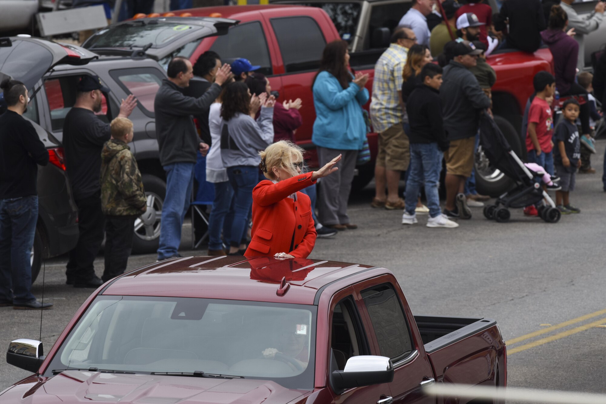 Mayor Brenda Gunter waves to participants during the Veteran’s Day Parade in San Angelo, Texas, Nov. 11, 2017. Gunter participated in the parade along with volunteers including Goodfellow service members, Veterans of Foreign Wars and other local organizations. (U.S. Air Force photo by Airman 1st Class  Zachary Chapman/Released)