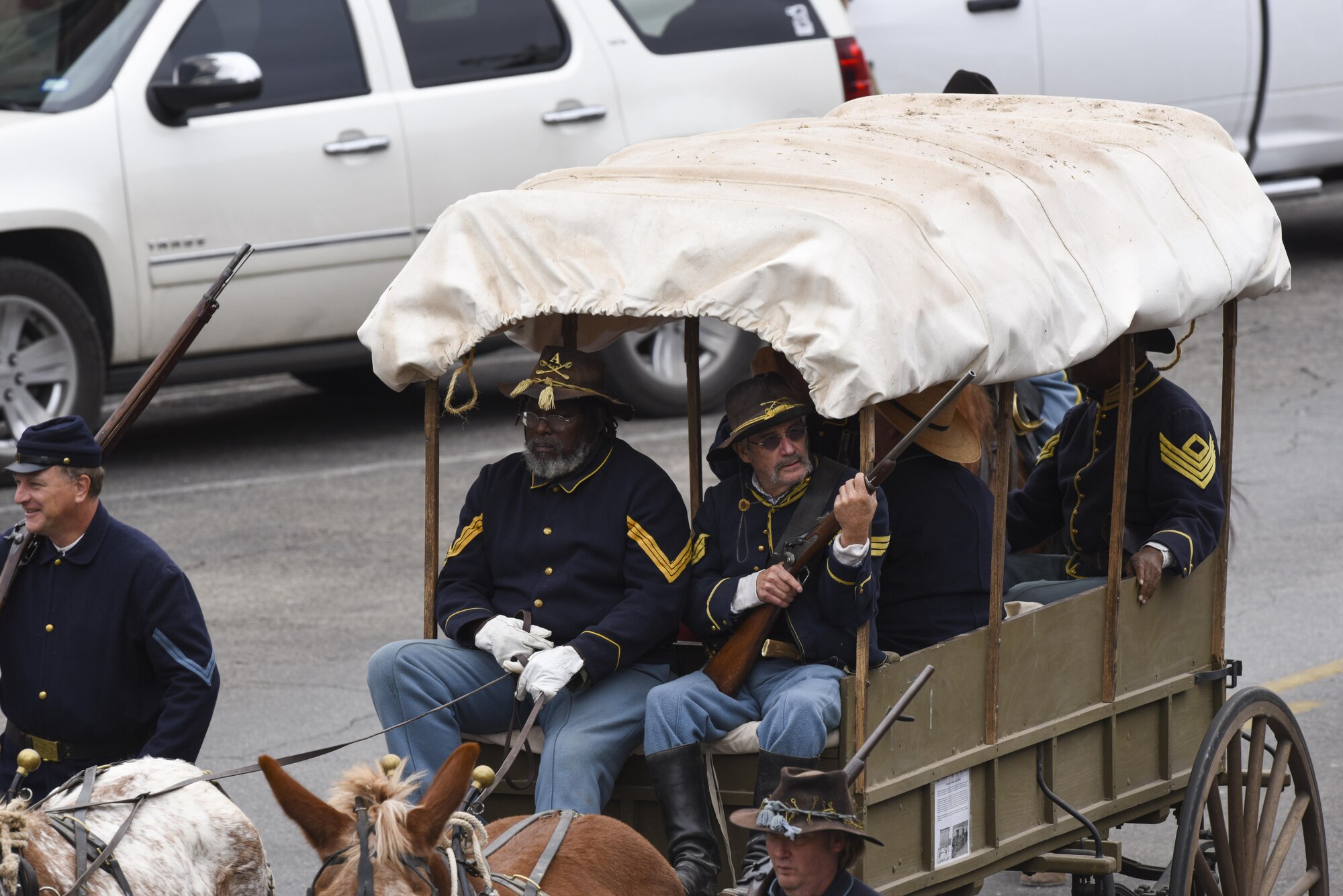 Fort Concho volunteers take part in the Veteran’s Day Parade in San Angelo, Texas, Nov. 11, 2017. Volunteers in historically accurate attire, rode in a horse drawn carriage along the parade route through downtown. (U.S. Air Force photo by Airman 1st Class  Zachary Chapman/Released)