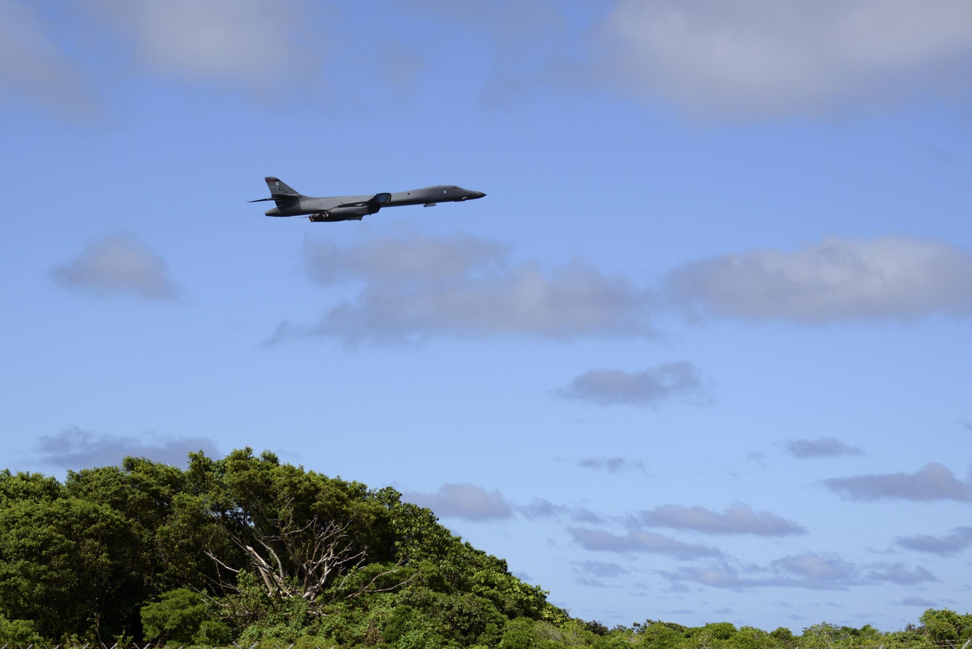 A U.S. Air Force B-1B Lancer assigned to the 37th Expeditionary Bomb Squadron, deployed from Ellsworth Air Force Base, South Dakota, takes off from Andersen AFB, Guam for a mission flying in the Western Pacific, Nov. 13, 2017