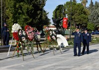 Turkish Air Force Col. Kursad Yildiz, 10th Tanker Base wing commander, and U.S. Air Force Col. Michael Rimsky, 39th Air Base Wing vice commander, render salutes as a display of respect for Mustafa Kemal Ataturk at Incirlik Air Base, Turkey, Nov. 10, 2017.