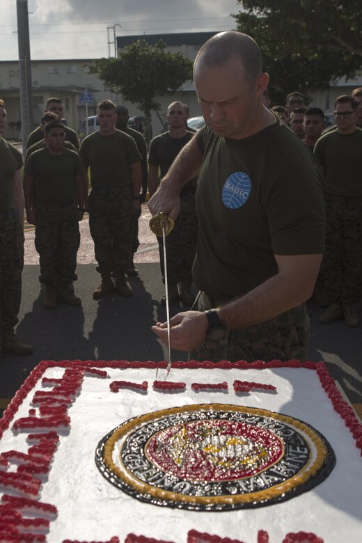 MCAS FUTENMA, OKINAWA, Japan— Lt. Col. Richard Ashford cuts the cake during the Cake Cutting Ceremony after the 242-mile Birthday Run on Marine Corps Air Station Futenma, Okinawa, Japan.