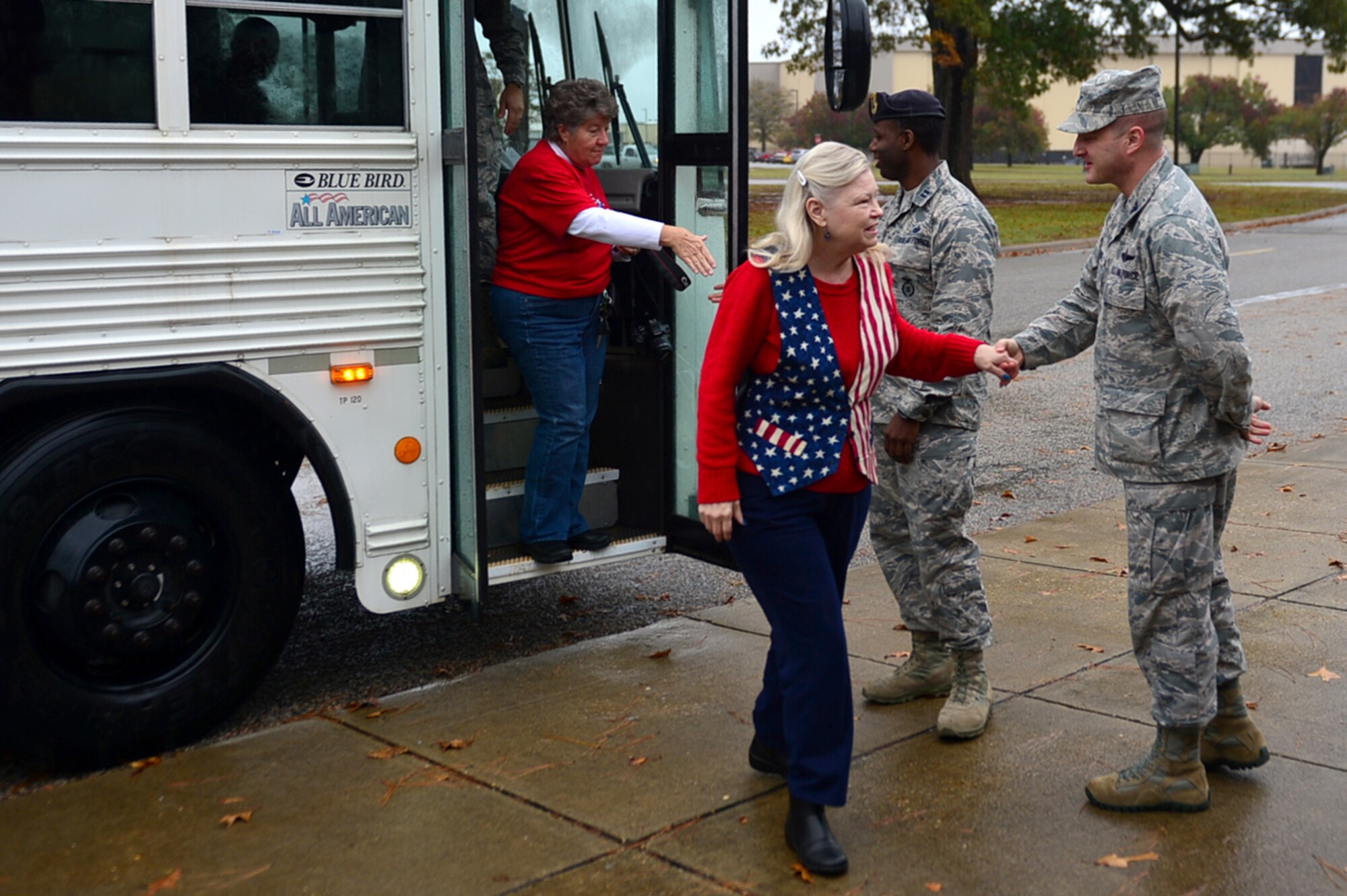 Members of the Quilts of Valor Foundation (QOVF) are greeted by 20th Fighter Wing (FW) leadership during a QOVF event at Shaw Air Force Base, South Carolina, Nov. 9, 2017.