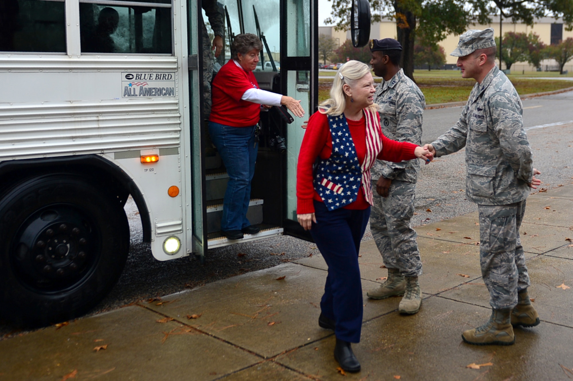 Members of the Quilts of Valor Foundation (QOVF) are greeted by 20th Fighter Wing (FW) leadership during a QOVF event at Shaw Air Force Base, South Carolina, Nov. 9, 2017.