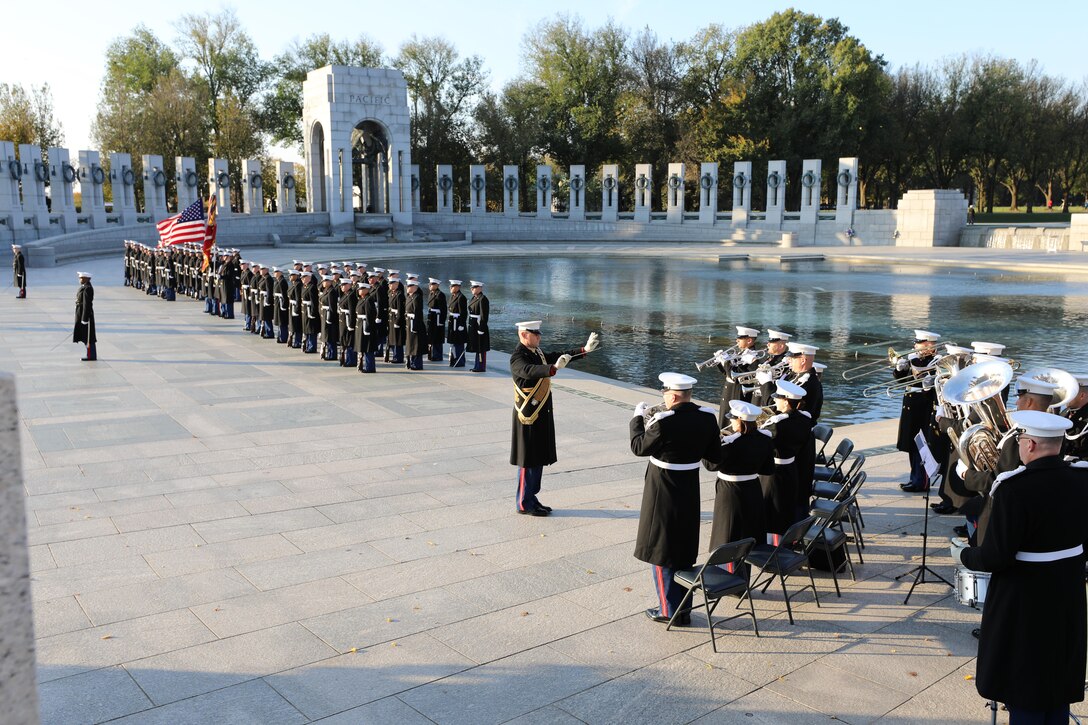 On Nov. 10, 2017, the U.S. Marine Band and the Ceremonial Escort from Marine Barracks Washington participated in a wreath-laying ceremony in honor of the Marine Corps' 242nd birthday at the National World War II Memorial in Washington, D.C. (U.S. Marine Corps photo by Master Sgt. Amanda Simmons/released)