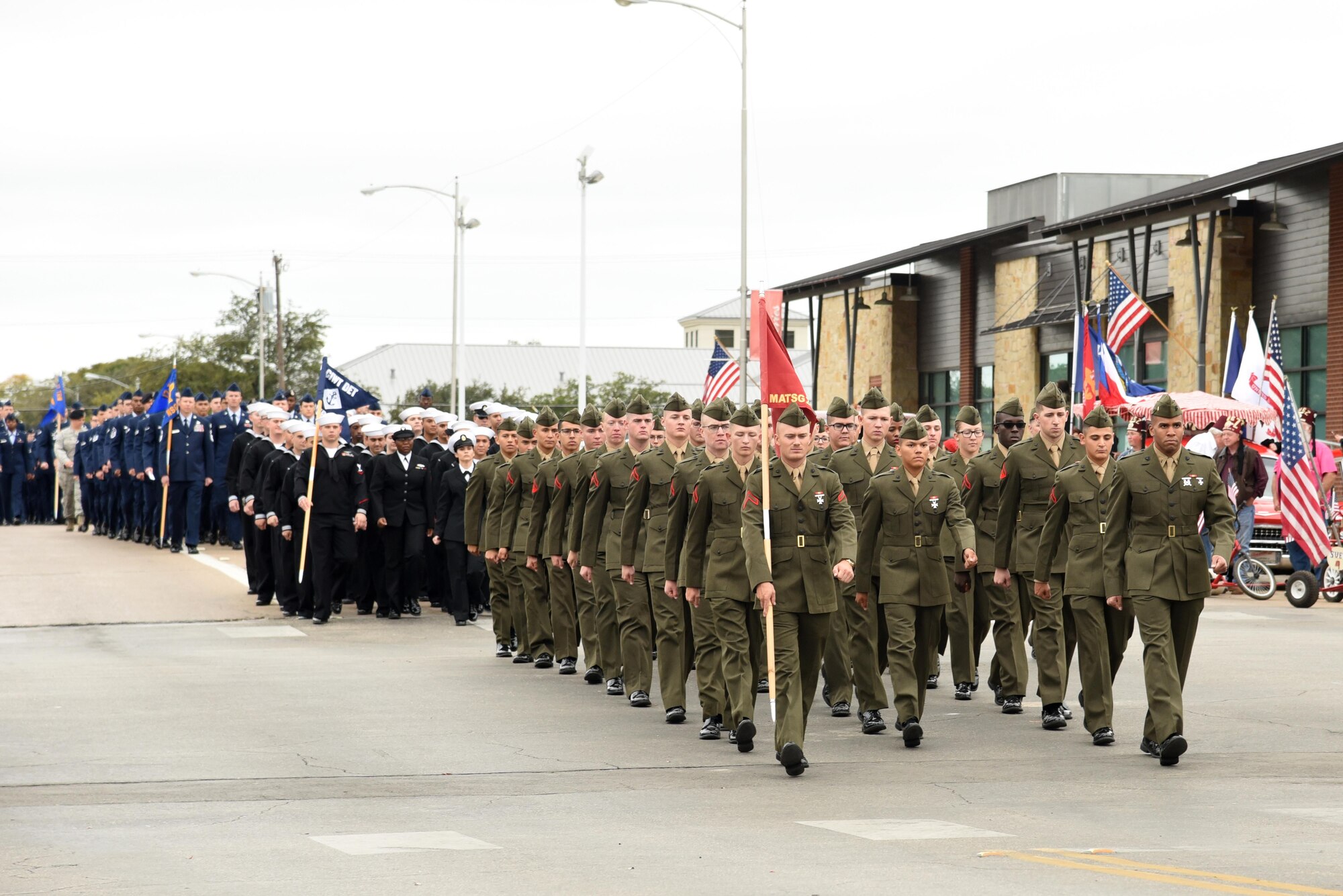 Marines, Sailors and Airmen from Goodfellow Air Force Base march in San Angelo’s Veteran’s Day Parade Nov. 11, 2017, San Angelo, Texas.