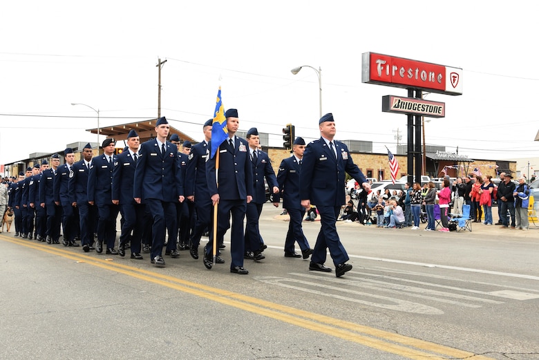 U.S. Air Force Lt. Col. John Travieso, 17th Contracting Squadron commander, and Chief Master Sgt. Franklin Chism, 17th Mission Support Group superintendent, lead the 17th Mission Support Group formation in San Angelo’s Veteran’s Day Parade Nov. 11, 2017, San Angelo, Texas.