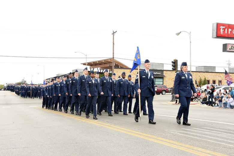 U.S. Air Force Col. Kari Stone, 17th Medical Operations Squadron commander, and Chief Master Sgt. Jeffrey Compton, 17th Medical Group superintendent, lead the 17th Medical Group formation in San Angelo’s Veteran’s Day Parade Nov. 11, 2017, San Angelo, Texas.