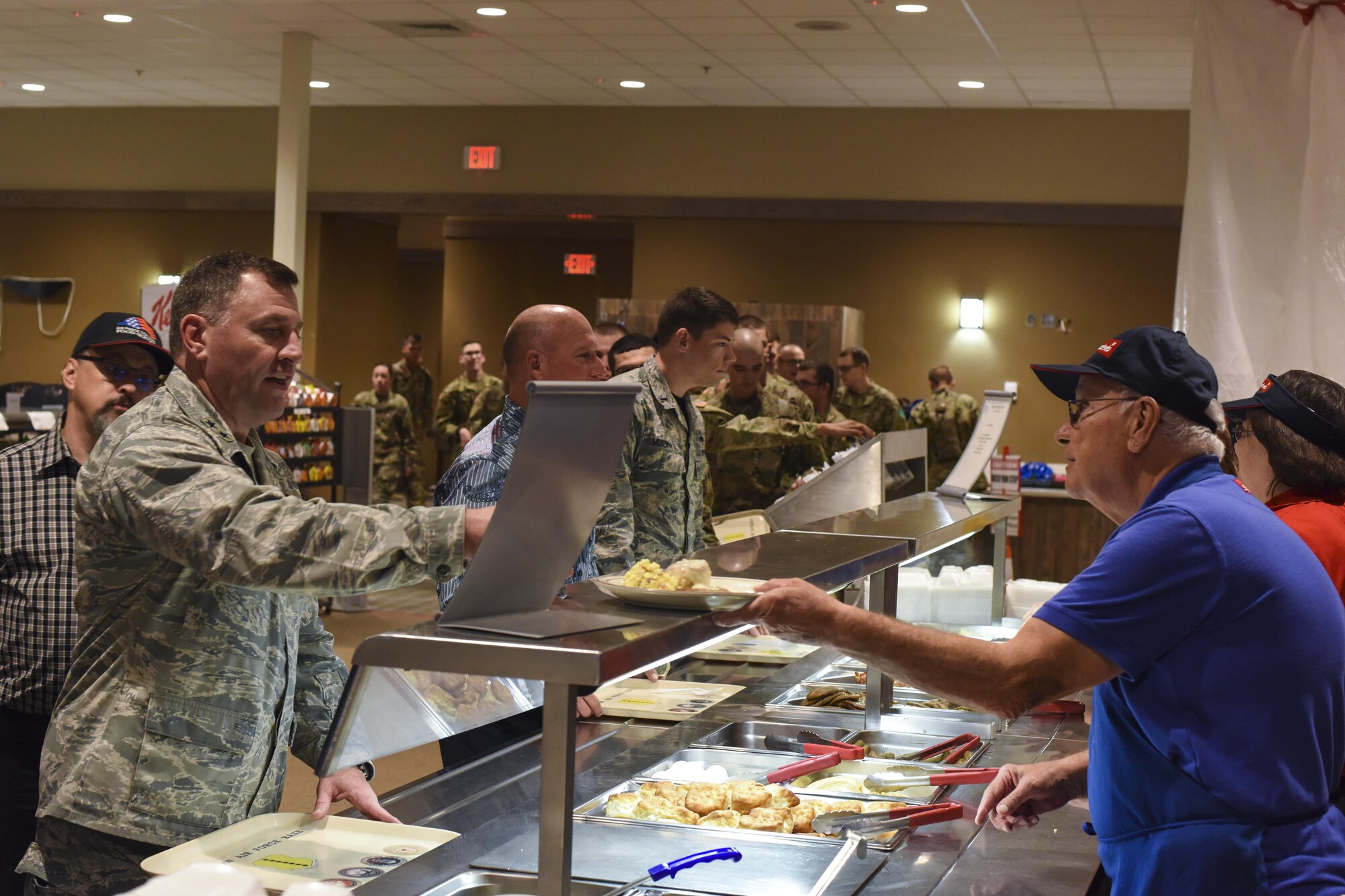 U.S. Air Force Maj. Gen. Timothy Leahy, 2nd Air Force commander, gets breakfast before a question and answer with 17th Training Wing Airmen at the Western Winds Dining Facility on Goodfellow Air Force Base, Texas, Nov. 3, 2017.  The Airmen in attendance were tasked with being ready to ask Leahy any questions they had, along with answering their questions Leahy spoke about lessons that he has learned in the Air Force. (U.S. Air Force photos by Airman 1st Class Zachary Chapman/Released)