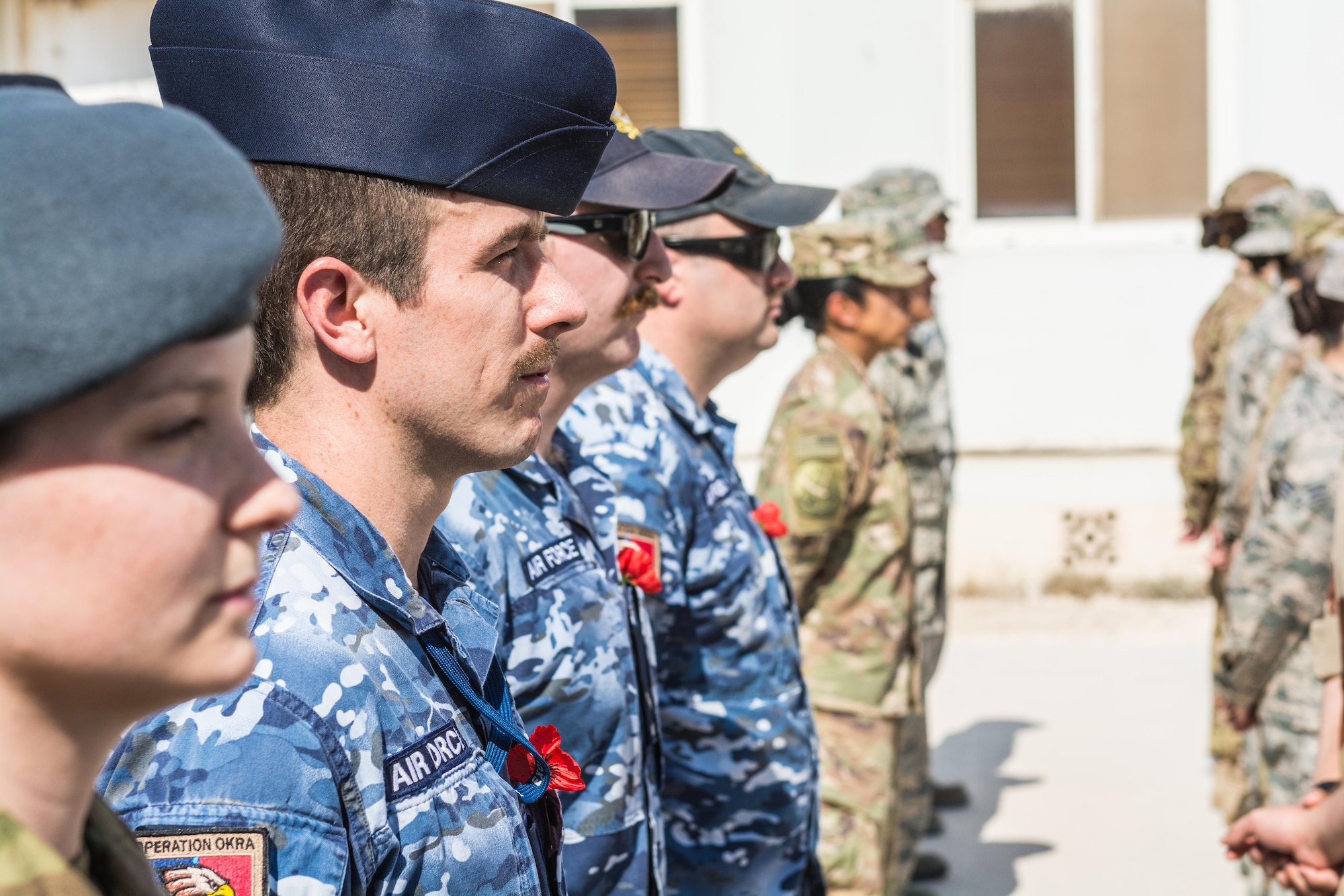 Coalition partners hold joint Remembrance and Veterans Day parade at Al Udeid