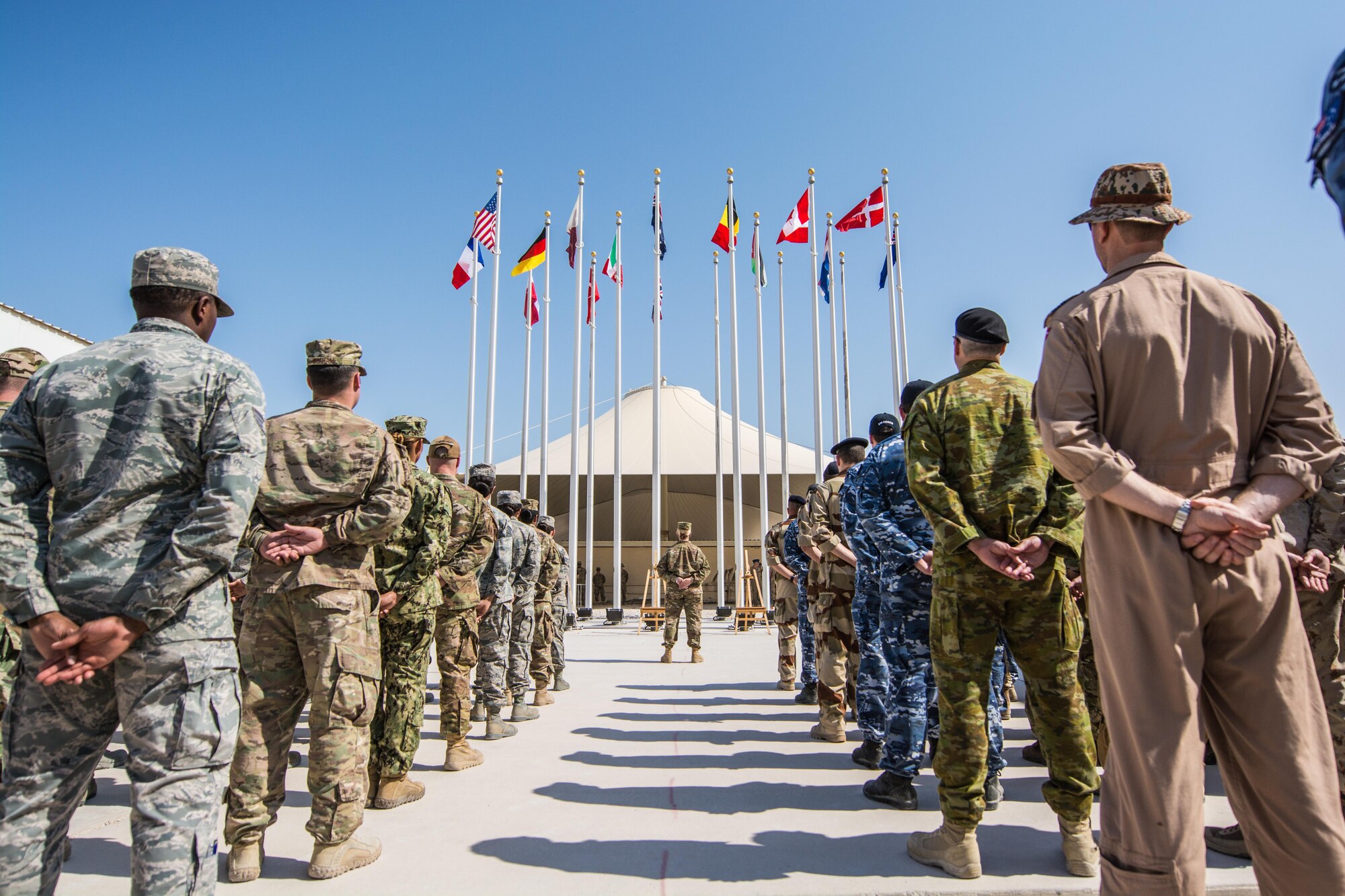 Coalition partners hold joint Remembrance and Veterans Day parade at Al Udeid