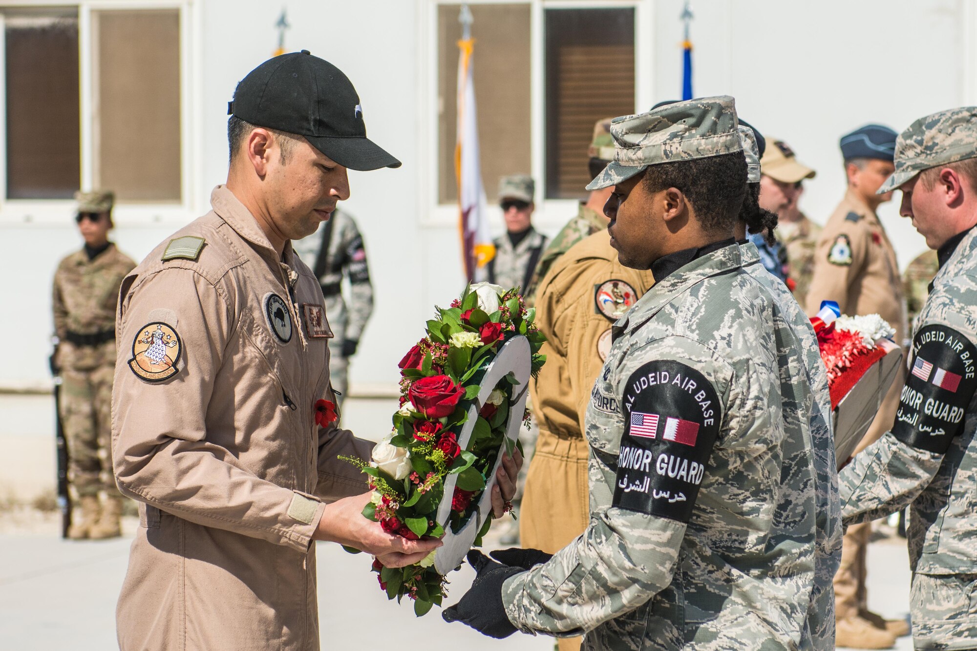 Coalition partners hold joint Remembrance and Veterans Day parade at Al Udeid