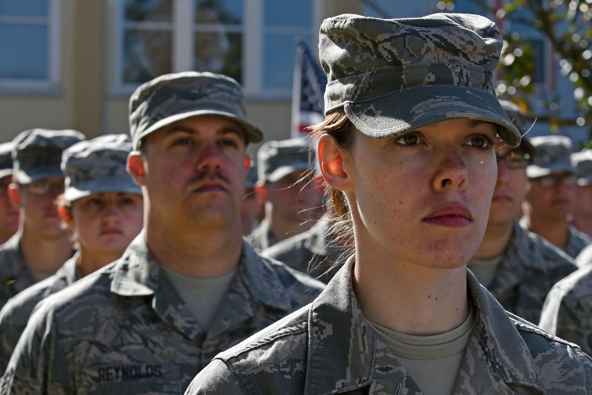 U.S. Airmen attending the 20th Force Support Squadron Senior Master Sgt. David B. Reid Airman Leadership School stand in formation during a Veterans Day Celebration ceremony in Sumter, South Carolina, Nov. 11, 2017.